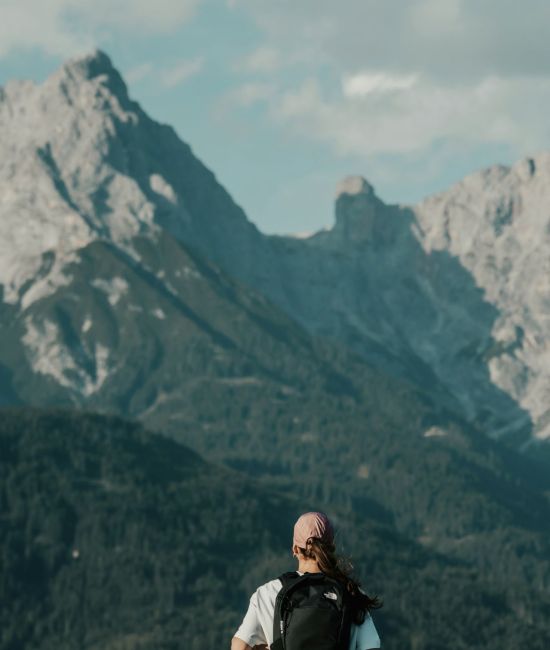 Woman hiking with the Steinerne Meer in the background